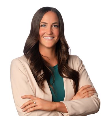 Portrait of Maddie Comfort, REALTOR®.
